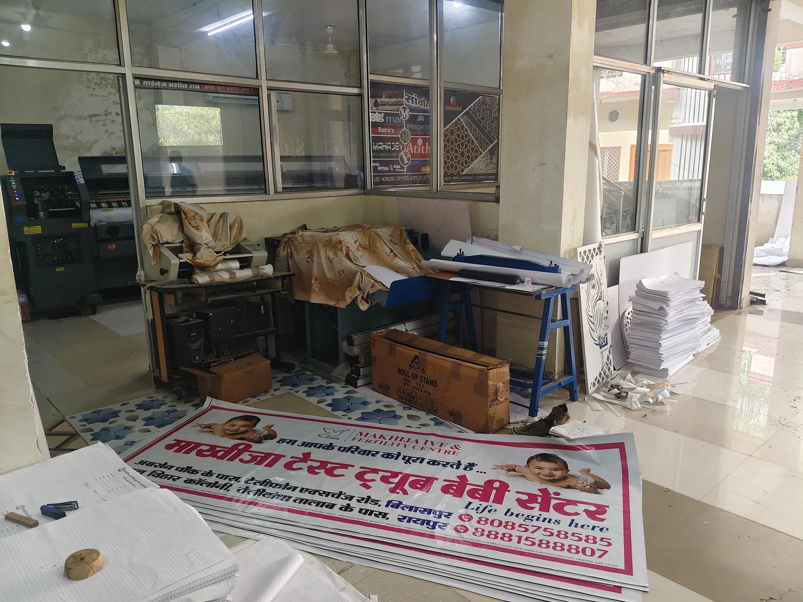 Spacious dry flex banner finishing and eyeleting area in plant