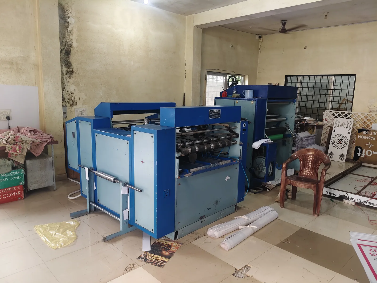 Thermal film lamination and finishing machine operating in plant