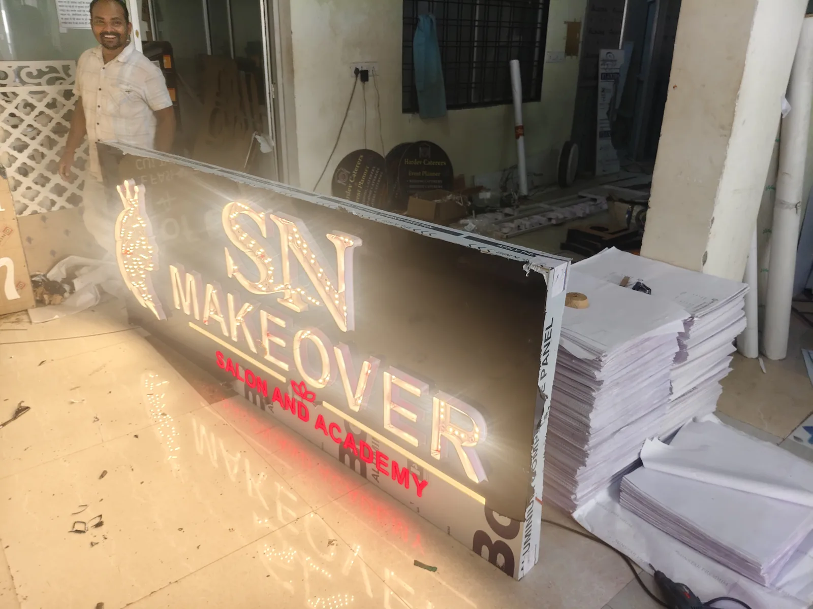 Workshop sign board assembly and letter finishing in progress